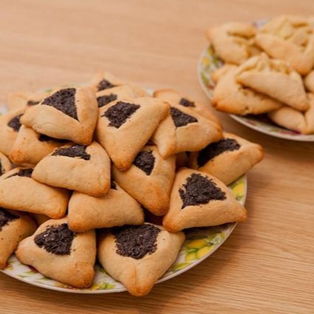 Purim: Reeling From Relevance - Pull Up a Chair - podcast episode cover