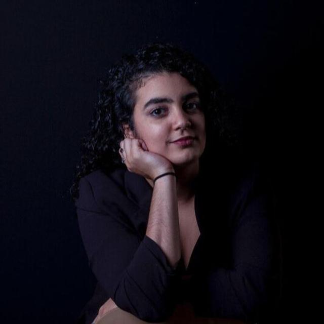 Interview with Femme Filmmakers Festival prize-winner Isabella Breton on her short film Aquí y Allá - podcast episode cover