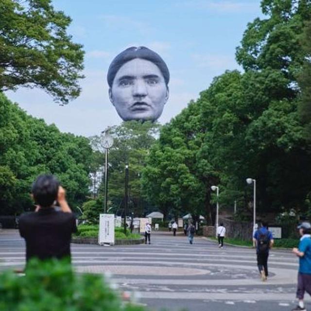 Giant Head Appears in the Sky over Tokyo - podcast episode cover