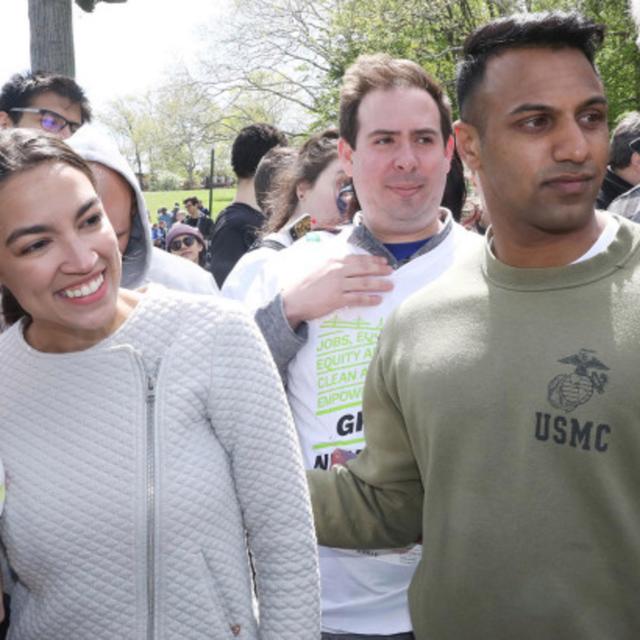 🌌 Portaling Report: AOC, One Finger-Pointing Chihuahua, {Allegedly} Wants a "Purge" on Urban Black America ⬇ - podcast episode cover